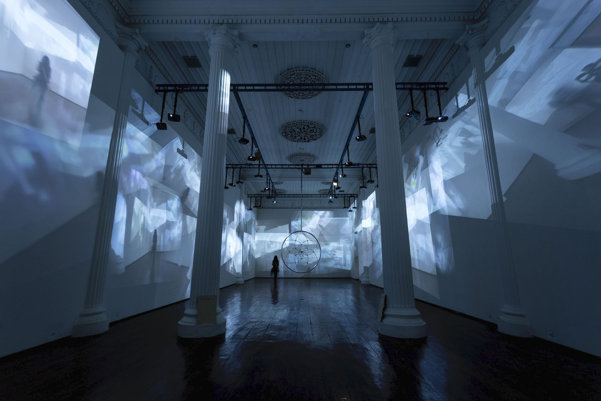 Gary Hill, ''Dream Stop,'' 2015. Mixed media with aluminum, 31 video cameras, 31 projectors and hardware. Dimensions variable. Installation view at Durbar Hall, Ernakulam.